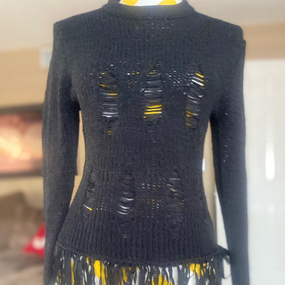 Distressed black sweater